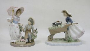 Two Lladro figures, printed impress marks, the first modelled as a girl pushing a wheelbarrow with