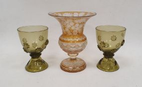 Group of continental coloured glassware, comprising a Bohemian amber flushed engraved vase of flared