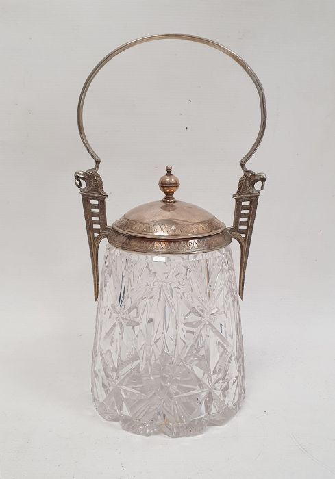 An early 20th century cut glass and silver-plate mounted jar and cover, with silver-plated loop