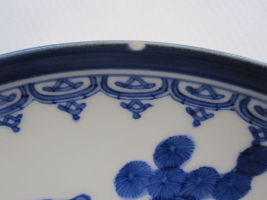 Set of six Japanese Hirado-type porcelain saucer dishes, each painted in underglaze blue with boys - Image 3 of 3