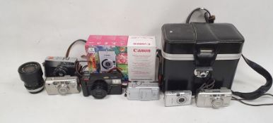 Bolex 280 macrozoom camera, a Kodak electric 8 automatic camera, boxed, a Canon lens FD135mm, a
