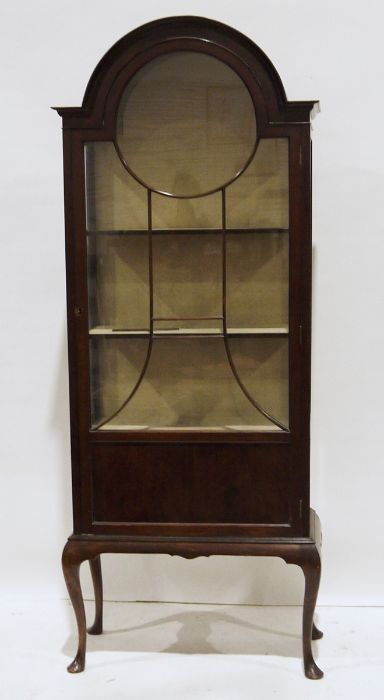Early 20th century mahogany display cabinet, the dome top with astragal glazed door enclosing