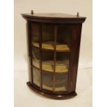 Modern mahogany corner display cabinet, moulded corners, astragal glazed doors enclosing shelves,