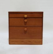 Mid century modern bedside chest by Stag, with brushing slide above two drawers, on plinth base,