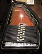 Ashbury Auto Harp in an  Oscar Schmidt case, various accessories  55cm long, in case   ( please note