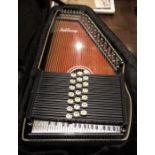 Ashbury Auto Harp in an  Oscar Schmidt case, various accessories  55cm long, in case   ( please note