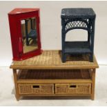 Red painted corner cupboard with mirror door, bamboo and wicker two-tier side table, a wicker coffee