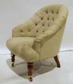 Reproduction buttonback armchair on baluster supports and castors
