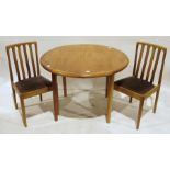 Mid century modern Meredew teak extending table and six chairs on turned supports (7)