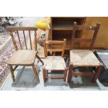 Rush seated beech children's chair and two further children's chairs, one in need of repair.