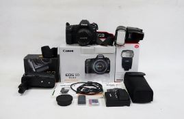 Canon EOS 5D Mark II digital camera, with Canon lens EF 50 mm 1:1.4, a Canon 580EX II Electronic