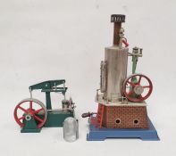 German tinplate and metal model stationary steam engine, 34cm high and an Airfix plastic model