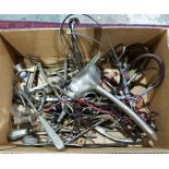 Large quantity of metal surgical instruments in one box