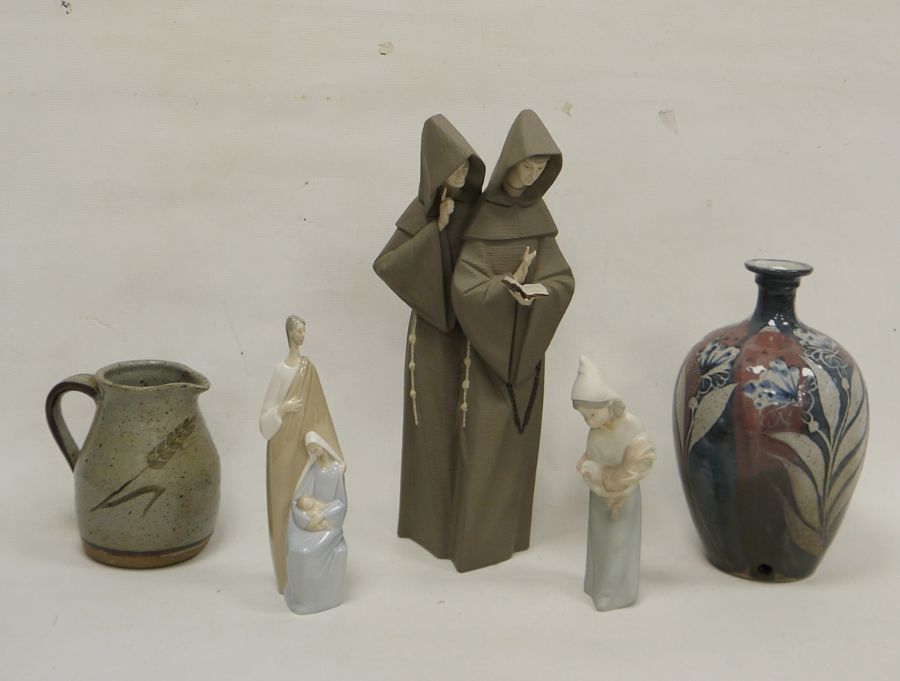 Collection of studio stoneware and Lladro figures, comprising a studio pottery lamp base decorated