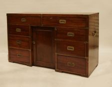 19th century-style mahogany campaign desk, the rectangular top above eight drawers and kennel