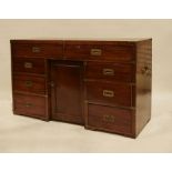 19th century-style mahogany campaign desk, the rectangular top above eight drawers and kennel