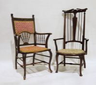 Mahogany framed chair with carved top rail, with upholstered back and spindled lower half,