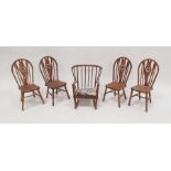 Set of four miniature wooden Windsor wheelback chairs and a stickback miniature rocking chair (5)