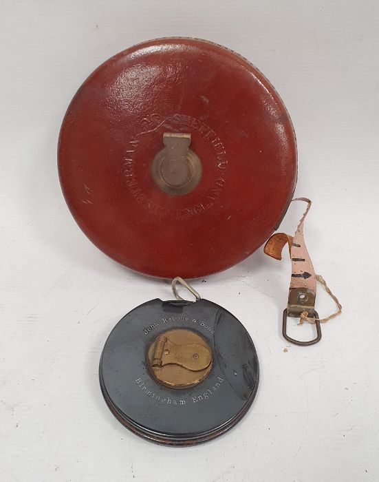 Old Chesterman surveyor's tape in brass mounted leather case, 15cm diameter and a John Raybon & Sons