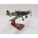 Painted wood model of a MK-1 Hawker Hurricane aeroplane, 19cm high