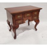 Modern mahogany lowboy, the rectangular top with applied moulded edge above five assorted drawers,