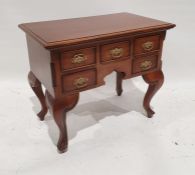 Modern mahogany lowboy, the rectangular top with applied moulded edge above five assorted drawers,