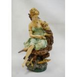 Painted cast iron figure of female feeding eagle Condition Report Approx. Weight 21.13kg No