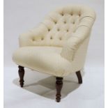 Modern Stuart Jones armchair in pale cream ground upholstery, on turned front legs