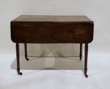 Late Victorian mahogany Pembroke table on turned supports to brown china castors