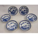 Set of six Japanese Hirado-type porcelain saucer dishes, each painted in underglaze blue with boys