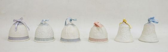 Collection of six Lladro commemorative bells, in blue or pink, each dated 1983 through to 1998, each