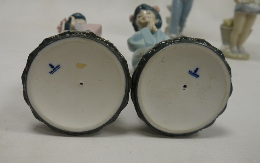 Four Lladro figures and a Nao figure, 20th century, printed marks, comprising two figures of Chinese - Image 2 of 15