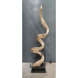 Abstract sculpture floor light fitting in the form of coiled driftwood, 130cm high