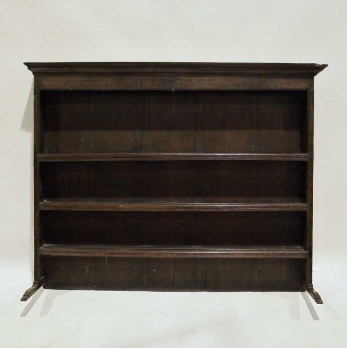 18th century oak dresser rack with moulded cornice above hooks and open shelves