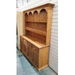 20th century pine dresser with moulded cornice above two shelves, spice drawers, the rectangular