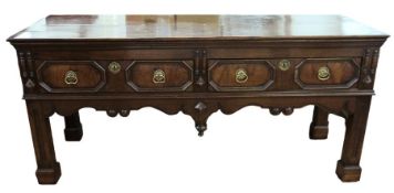 18th century and later oak sideboard, the rectangular top above two geometric patterned drawers with