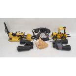 Two yellow metal Tonka toys, two pairs of binoculars, large shell and a reproduction telephone (6)