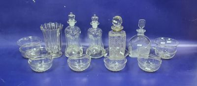Collection of decanters and glassware, including two glug-glug decanters and stoppers, a decanter