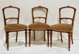 Six Victorian dining chairs with carved top rails, turned and fluted front supports to peg feet (6)