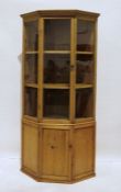 Vintage pine corner cupboard with single glazed door above cupboard door, on plinth base Approx.