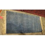 Chinese blue ground rug with floral pattern, 160cm x 69cm