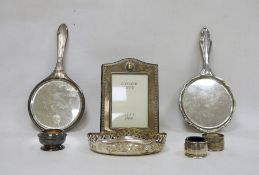 Two silver mounted hand mirrors, silver napkin ring, silver salts and a small quantity of plated