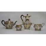 Edwardian silver tea and coffee service, comprising: a fluted baluster coffee-pot and cover, 24 cm