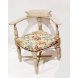 Cream painted corner elbow chair with floral fabric stuffover seat