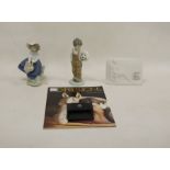 Nao figure of a boy with a football and a Lladro figure of Pretty Pickings No.05222, 15cm high,