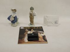 Nao figure of a boy with a football and a Lladro figure of Pretty Pickings No.05222, 15cm high,