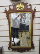 19th century fretwork carved mirror, the rectangular plate in mahogany fretwork carved frame with