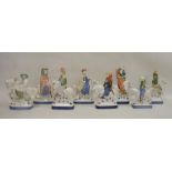 Eight Rye pottery Canterbury Tales figures on horseback, printed blue marks, each bearing label,