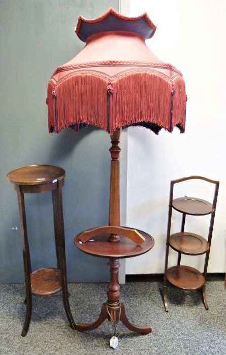 20th century folding cakestand, an oak two-tier circular jardiniere stand and a standard lamp and