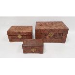 Chinese nesting set of three miniature camphorwood lined chests with carved decoration